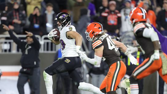 Baltimore Ravens tight end Mark Andrews (89) sprints away from Cleveland Browns linebacker Carson Schwesinger (49) on his way to the end zone during the second half of an NFL football game at Huntington Bank Field, Nov. 16, 2025, in Cleveland, Ohio.