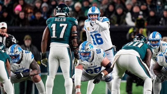 Detroit Lions quarterback Jared Goff talks to teammates before a play against the Philadelphia Eagles during the first half at Lincoln Financial Field in Philadelphia on Sunday, November 16, 2025.
