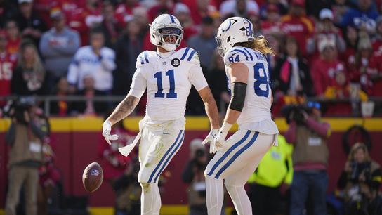 Nov 23, 2025; Kansas City, Missouri, USA; Indianapolis Colts wide receiver Michael Pittman Jr. (11) celebrates with tight end Tyler Warren (84) after scoring a touchdown against the Kansas City Chiefs in the first quarter at GEHA Field at Arrowhead Stadium. 