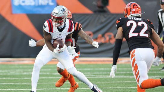 Nov 23, 2025; Cincinnati, Ohio, USA; New England Patriots wide receiver Stefon Diggs (8) makes a catch against Cincinnati Bengals cornerback DJ Turner II (20) during the second half at Paycor Stadium.