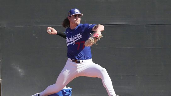 Los Angeles Dodgers pitcher River Ryan throws bullpen during spring training camp. Los Angeles Dodgers pitcher River Ryan throws bullpen during spring training camp.