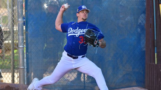 Los Angeles Dodgers pitcher Gavin Stone (35) throws during a Spring Training workout at Camelback Ranch. Los Angeles Dodgers pitcher Gavin Stone (35) throws during a Spring Training workout at Camelback Ranch.