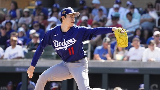 Los Angeles Dodgers pitcher Roki Sasaki (11) throws to the Arizona Diamondbacks in the first inning on Feb. 25, 2026, at Salt River Fields in Scottsdale Los Angeles Dodgers pitcher Roki Sasaki (11) throws to the Arizona Diamondbacks in the first inning on Feb. 25, 2026, at Salt River Fields in Scottsdale