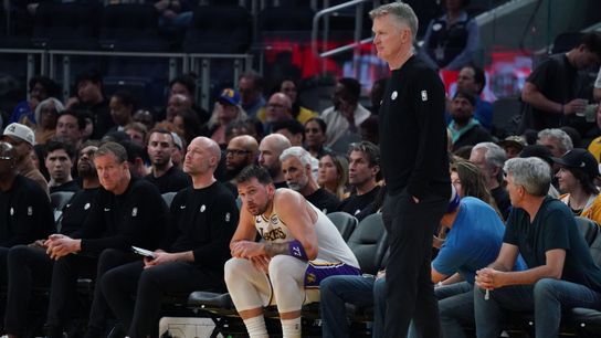 Los Angeles Lakers forward/guard Luka Doncic (77) catches his breathe on the Golden State Warriors bench during a break in the action in the third period at Chase Center. 
