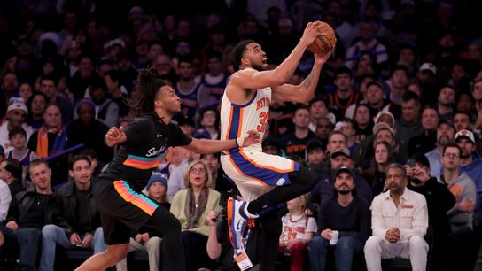 Mar 1, 2026; New York, New York, USA; New York Knicks center Karl-Anthony Towns (32) drives to the basket against San Antonio Spurs guard Stephon Castle (5) during the third quarter at Madison Square Garden. Mar 1, 2026; New York, New York, USA; New York Knicks center Karl-Anthony Towns (32) drives to the basket against San Antonio Spurs guard Stephon Castle (5) during the third quarter at Madison Square Garden.