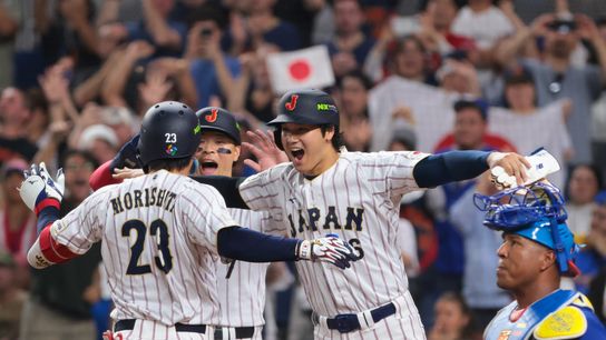 Japan right fielder Shota Morishita (23) celebrates with designated hitter Shohei Ohtani (16) after hitting a two-run home run against Venezuela in the third inning during a quarterfinal game of the 2... 