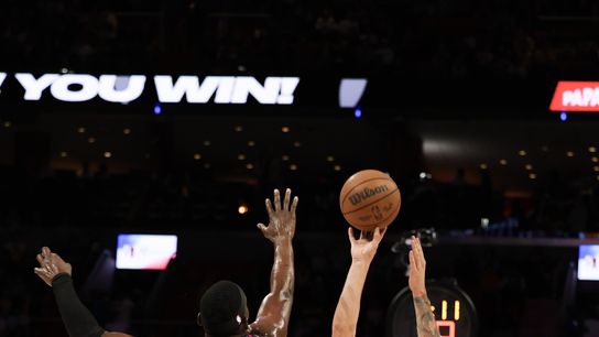 Los Angeles Lakers guard Luka Doncic (77) shoots over Miami Heat center Bam Adebayo (13) during the first half at Kaseya Center. Los Angeles Lakers guard Luka Doncic (77) shoots over Miami Heat center Bam Adebayo (13) during the first half at Kaseya Center.