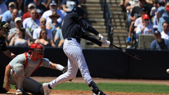 Mar 22, 2026; Tampa, Florida, USA;New York Yankees infielder Ryan McMahon (19) hits an RBI single during the fourth inning against the Philadelphia Phillies at George M. Steinbrenner Field. Mar 22, 2026; Tampa, Florida, USA;New York Yankees infielder Ryan McMahon (19) hits an RBI single during the fourth inning against the Philadelphia Phillies at George M. Steinbrenner Field.