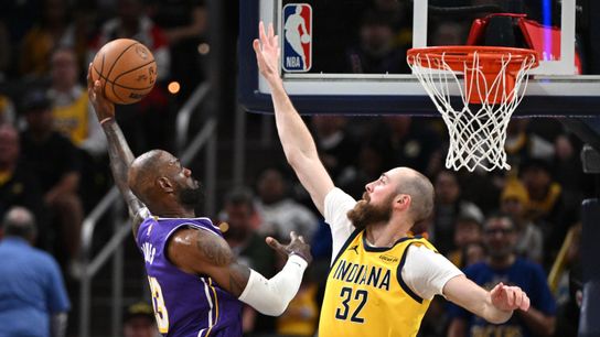 Los Angeles Lakers forward LeBron James (23) dunks the ball past Indiana Pacers center Jay Huff (32) during the second quarter at Gainbridge Fieldhouse. Los Angeles Lakers forward LeBron James (23) dunks the ball past Indiana Pacers center Jay Huff (32) during the second quarter at Gainbridge Fieldhouse.