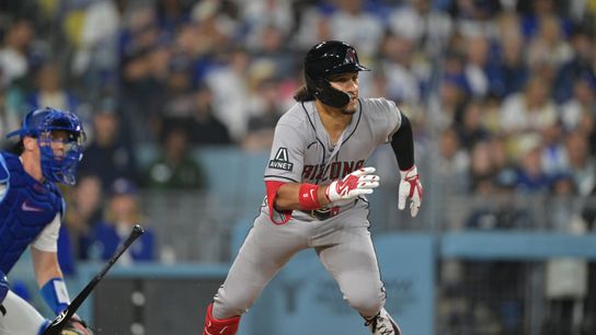 Arizona Diamondbacks center fielder Alek Thomas (5) hits a two RBI double against the Los Angeles Dodgers in the fourth inning at Dodger Stadium. Arizona Diamondbacks center fielder Alek Thomas (5) hits a two RBI double against the Los Angeles Dodgers in the fourth inning at Dodger Stadium.