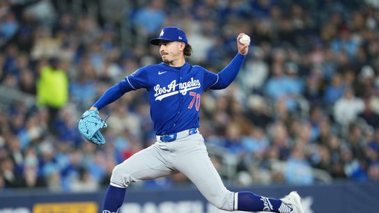 Los Angeles Dodgers starting pitcher Justin Wrobleski (70) throws a pitch against the Toronto Blue Jays during the first inning at Rogers Centre. Los Angeles Dodgers starting pitcher Justin Wrobleski (70) throws a pitch against the Toronto Blue Jays during the first inning at Rogers Centre.