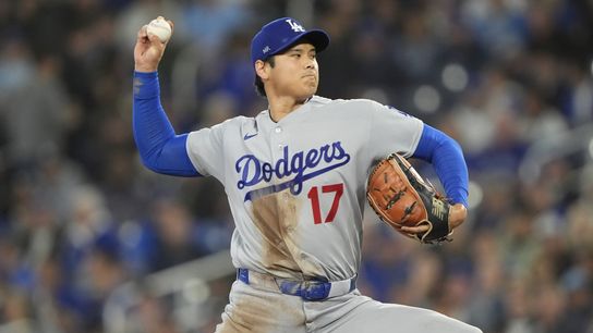 Los Angeles Dodgers starting pitcher Shohei Ohtani (17) pitches to the Toronto Blue Jays during the first inning at Rogers Centre. Los Angeles Dodgers starting pitcher Shohei Ohtani (17) pitches to the Toronto Blue Jays during the first inning at Rogers Centre.