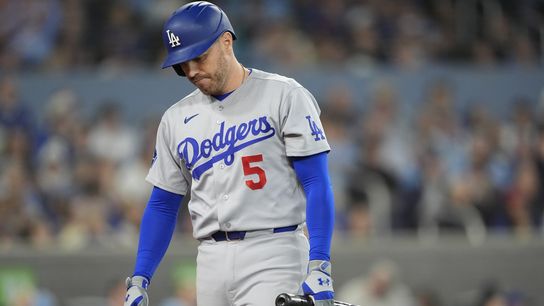 Los Angeles Dodgers first baseman Freddie Freeman (5) reacts after striking out against the Toronto Blue Jays during the ninth inning at Rogers Centre. Los Angeles Dodgers first baseman Freddie Freeman (5) reacts after striking out against the Toronto Blue Jays during the ninth inning at Rogers Centre.