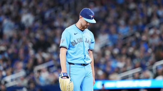 Toronto Blue Jays starting pitcher Eric Lauer (56) walks towards the dugout against the Minnesota Twins during the third inning at Rogers Centre. 