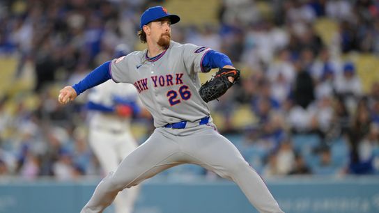 New York Mets pitcher Nolan McLean (26) throws a pitch against the Los Angeles Dodgers during the first inning at Dodger Stadium. 