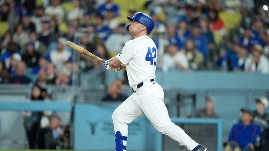Los Angeles Dodgers designated hitter Dalton Rushing hits a grand slam home run in the eighth inning against the New York Mets at Dodger Stadium. 