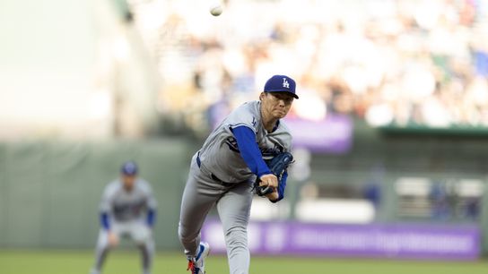 Los Angeles Dodgers starting pitcher Yoshinobu Yamamoto (18) throws against the San Francisco Giants during the first inning at Oracle Park. 