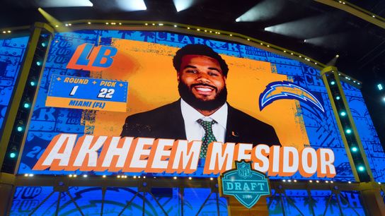 Chargers bolster pass rush drafting Akheem Mesidor taken at The Bolt. Photo by Kirby Lee-Imagn Images