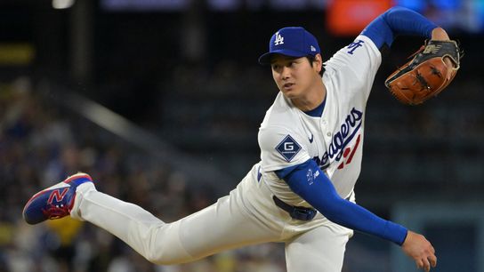 Los Angeles Dodgers starting pitcher Shohei Ohtani (17) delivers to the plate in the fifth inning against the Miami Marlins at Dodger Stadium. 