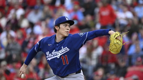 Los Angeles Dodgers starting pitcher Roki Sasaki (11) delivers a pitch against the St. Louis Cardinals in the third inning at Busch Stadium. 