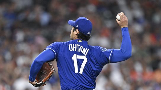 Los Angeles Dodgers starting pitcher Shohei Ohtani (17) delivers a pitch in the second inningv against the Houston Astros at Daikin Park. 