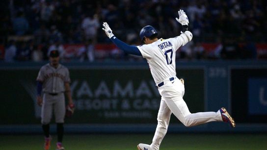 Los Angeles Dodgers designated hitter Shohei Ohtani (17) acknowledges the Dodgers bullpen and runs the bases after hitting a one run home run against San Francisco Giants starting pitcher Adrian House... 