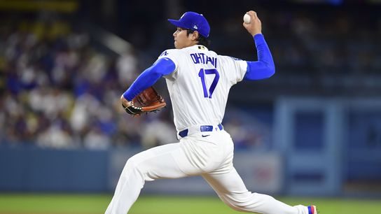 Los Angeles Dodgers two-way player Shohei Ohtani (17) delivers in the fifth inning against the San Francisco Giants at Dodger Stadium. 