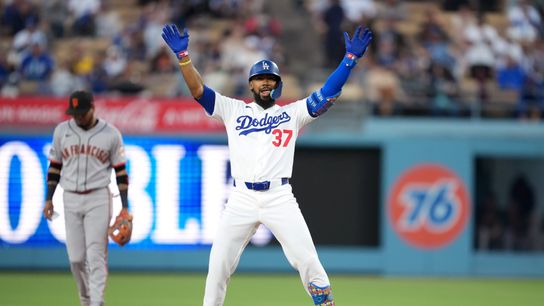 Los Angeles Dodgers left fielder Teoscar Hernandez (37) celebrates after hitting a double against the San Francisco Giants in the second inning at Dodger Stadium. Los Angeles Dodgers left fielder Teoscar Hernandez (37) celebrates after hitting a double against the San Francisco Giants in the second inning at Dodger Stadium.