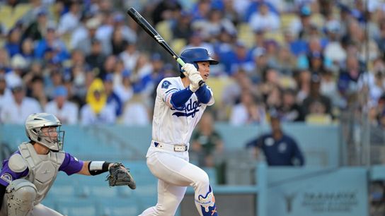 Los Angeles Dodgers second baseman Hyeseong Kim (6) hits a single against the Colorado Rockies in the third inning at Dodger Stadium. Los Angeles Dodgers second baseman Hyeseong Kim (6) hits a single against the Colorado Rockies in the third inning at Dodger Stadium.
