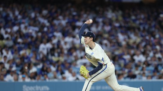 Los Angeles Dodgers starting pitcher Roki Sasaki (11) throws during the third inning against the Philadelphia Phillies at Dodger Stadium. 