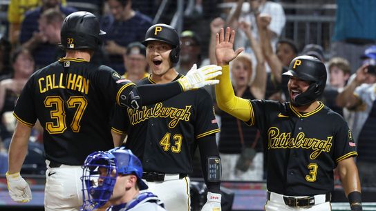 Pittsburgh Pirates catcher Raphael Flores Jr. (43) and third baseman Nick Gonzales (3) greet right fielder Tyler Callihan (37) crossing home plate on a three run home run for his second home run of th... Pittsburgh Pirates catcher Raphael Flores Jr. (43) and third baseman Nick Gonzales (3) greet right fielder Tyler Callihan (37) crossing home plate on a three run home run for his second home run of th...