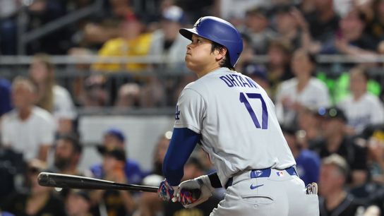 Los Angeles Dodgers designated hitter Shohei Ohtani (17) hits a two run home run against the Pittsburgh Pirates during the ninth inning at PNC Park. Los Angeles Dodgers designated hitter Shohei Ohtani (17) hits a two run home run against the Pittsburgh Pirates during the ninth inning at PNC Park.