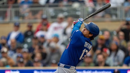 Los Angeles Dodgers designated hitter Shohei Ohtani (17) hits a RBI sacrifice fly against the Minnesota Twins in the fourth inning at Target Field. Los Angeles Dodgers designated hitter Shohei Ohtani (17) hits a RBI sacrifice fly against the Minnesota Twins in the fourth inning at Target Field.