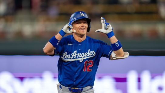 Los Angeles Dodgers right fielder Alex Call (12) celebrates hitting a home run against the Minnesota Twins in the eighth inning at Target Field. Los Angeles Dodgers right fielder Alex Call (12) celebrates hitting a home run against the Minnesota Twins in the eighth inning at Target Field.
