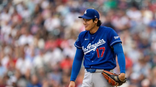 Los Angeles Dodgers starting pitcher Shohei Ohtani (17) smiles after getting an out against the Minnesota Twins in the first inning at Target Field. 
