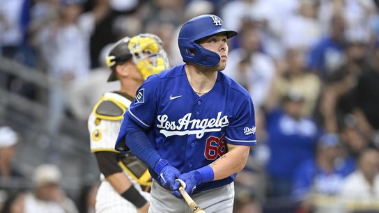 Los Angeles Dodgers catcher Dalton Rushing (68) hits a solo home run during the sixth inning against the San Diego Padres at Petco Park. 