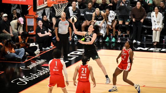 Jun 30, 2026; Brooklyn, New York, USA; New York Liberty forward Breanna Stewart (30) drives past Las Vegas Aces guard Jackie Young (0) during the second half at Barclays Center. 