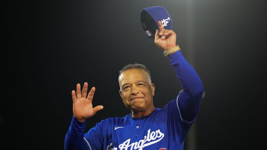 Los Angeles Dodgers manager Dave Roberts (30) gestures towards the crowd after the Los Angeles Dodgers defeat the Athletics as he earns his 1000th career win as a manager at Sutter Health Park. Los Angeles Dodgers manager Dave Roberts (30) gestures towards the crowd after the Los Angeles Dodgers defeat the Athletics as he earns his 1000th career win as a manager at Sutter Health Park.