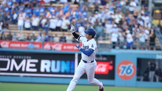 Los Angeles Dodgers designated hitter Shohei Ohtani (17) celebrates after hitting a home run during the first inning against the Arizona Diamondbacks at Dodger Stadium. 