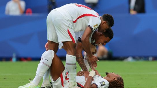 July 11, 2026; Miami Gardens, Florida, U.S.; England's Djed Spence celebrates with Jude Bellingham and Morgan Rogers after winning a penalty that is later disallowed by VAR. July 11, 2026; Miami Gardens, Florida, U.S.; England's Djed Spence celebrates with Jude Bellingham and Morgan Rogers after winning a penalty that is later disallowed by VAR.