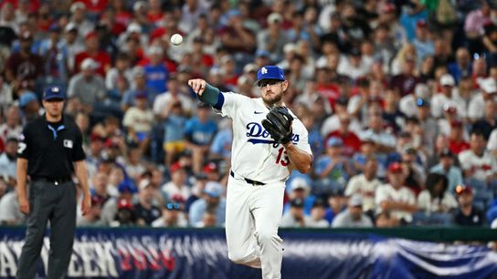 National League Los Angeles Dodgers third baseman Max Muncy (13) makes a throw to first base during the fourth inning against the American League at Citizens Bank Park. National League Los Angeles Dodgers third baseman Max Muncy (13) makes a throw to first base during the fourth inning against the American League at Citizens Bank Park.