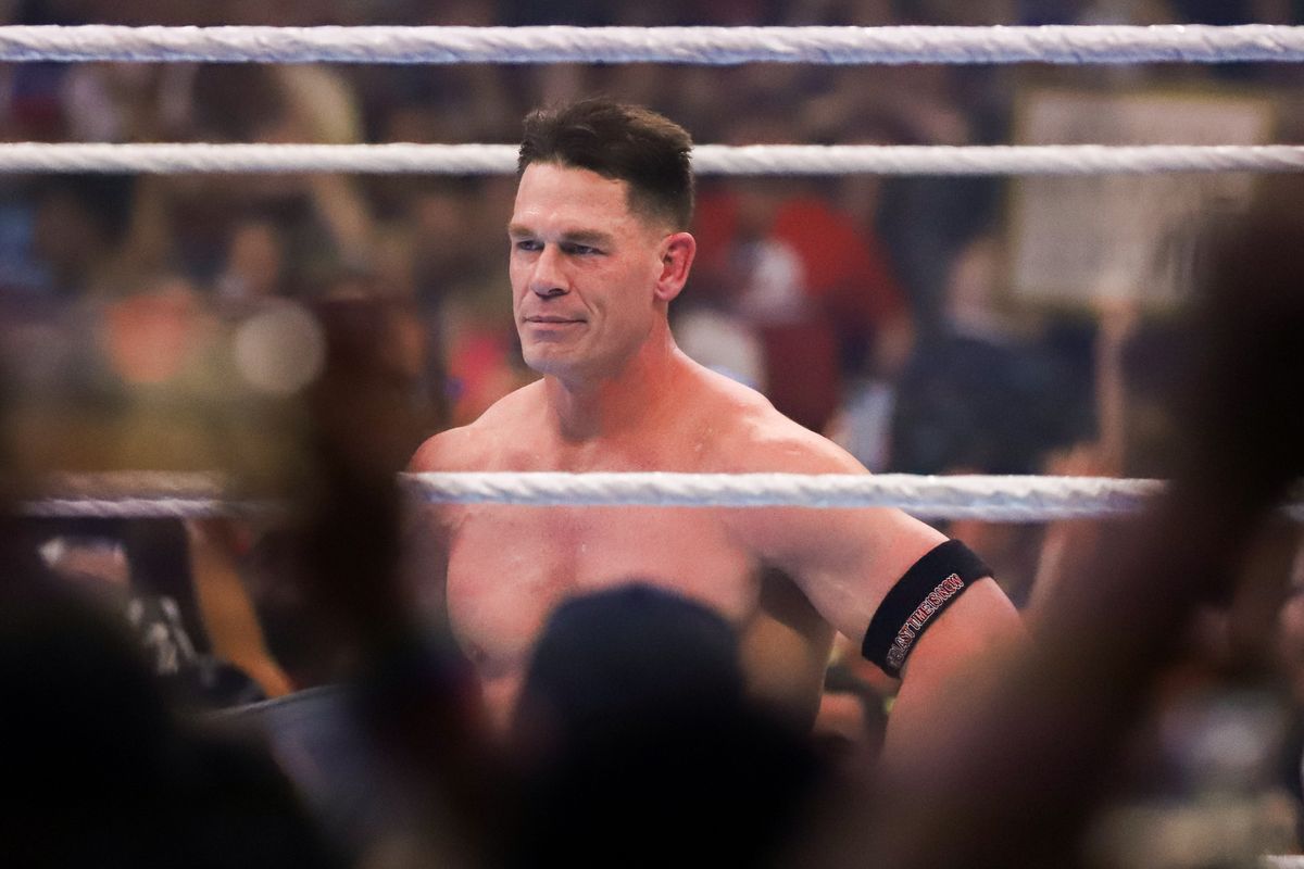 John Cena listens to the crowd after defeating Cody Rhodes in WWE Championship match during WrestleMania 41 In Las Vegas on Sunday April 20, 2025.