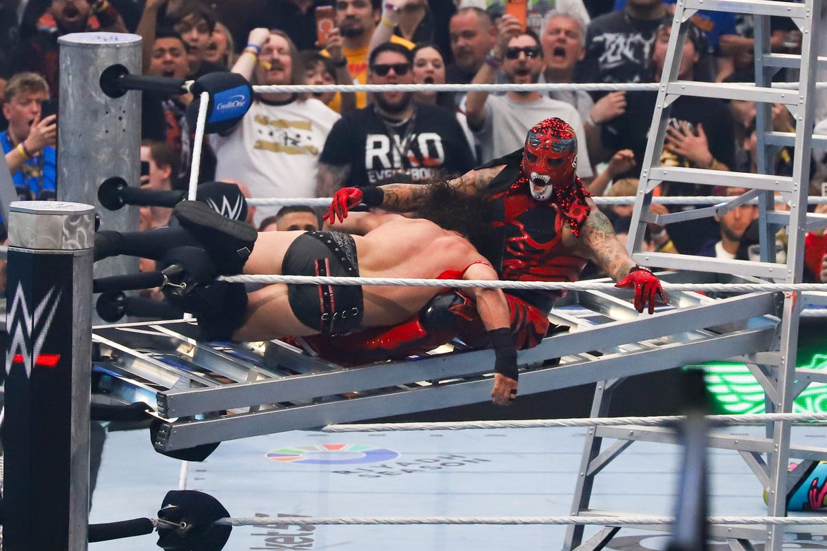 WWE wrestler Penta takes JD McDonagh  down, away from the belt in the Intercontinental Championship ladder match during WrestleMania 42 on Sunday April 19, 2026 at Allegiant Stadium.