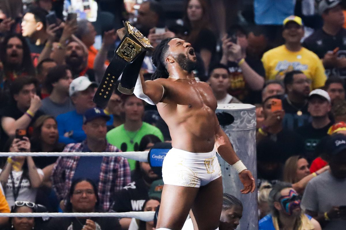 WWE wrestler Trick Williams holds the belt towards the crowd after defeating Sami Zayn in the United States Championship match during WrestleMania 42 on Sunday April 19, 2026 at Allegiant Stadium.