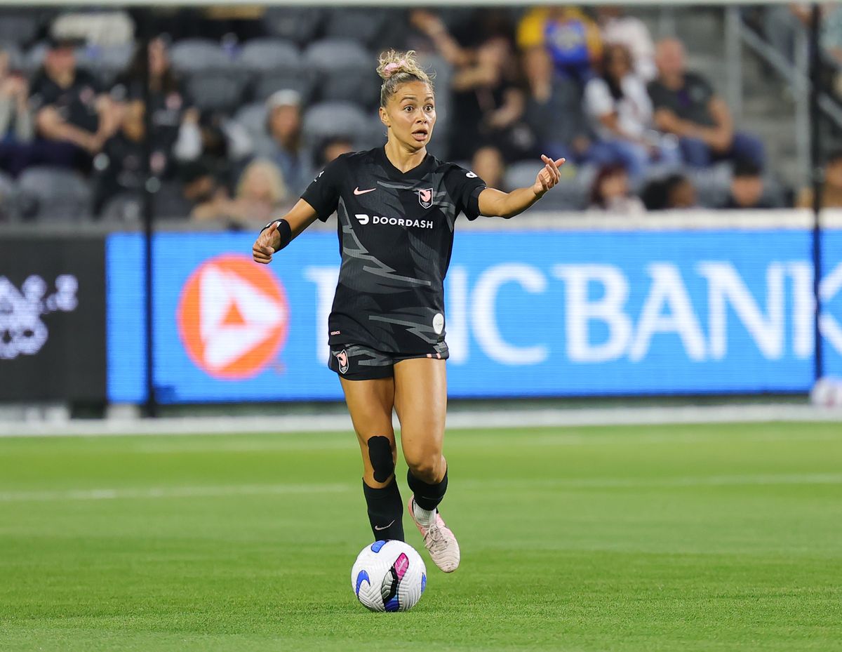 Angel City FC defender (11) Sarah Gorden kicks the ball downfield against the Utah Royals on May 9, 2025 in Los Angeles, CA.
