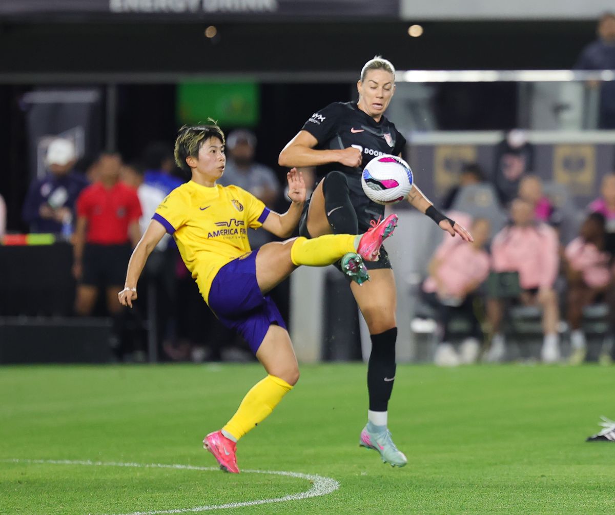 Angel City FC defender (14) Alanna Kennedy goes for the ball against the Utah Royals on May 9, 2024 in Los Angeles, CA.