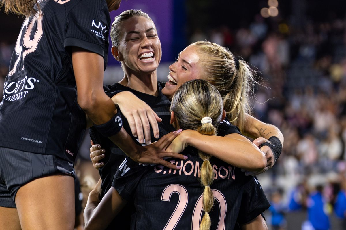 Angel City FC attacker Riley Tiernan (33) and her teammates celebrate her goal during an NWSL match against Racing Louisville FC, Saturday May 24, 2025 in Los Angeles, Calif.