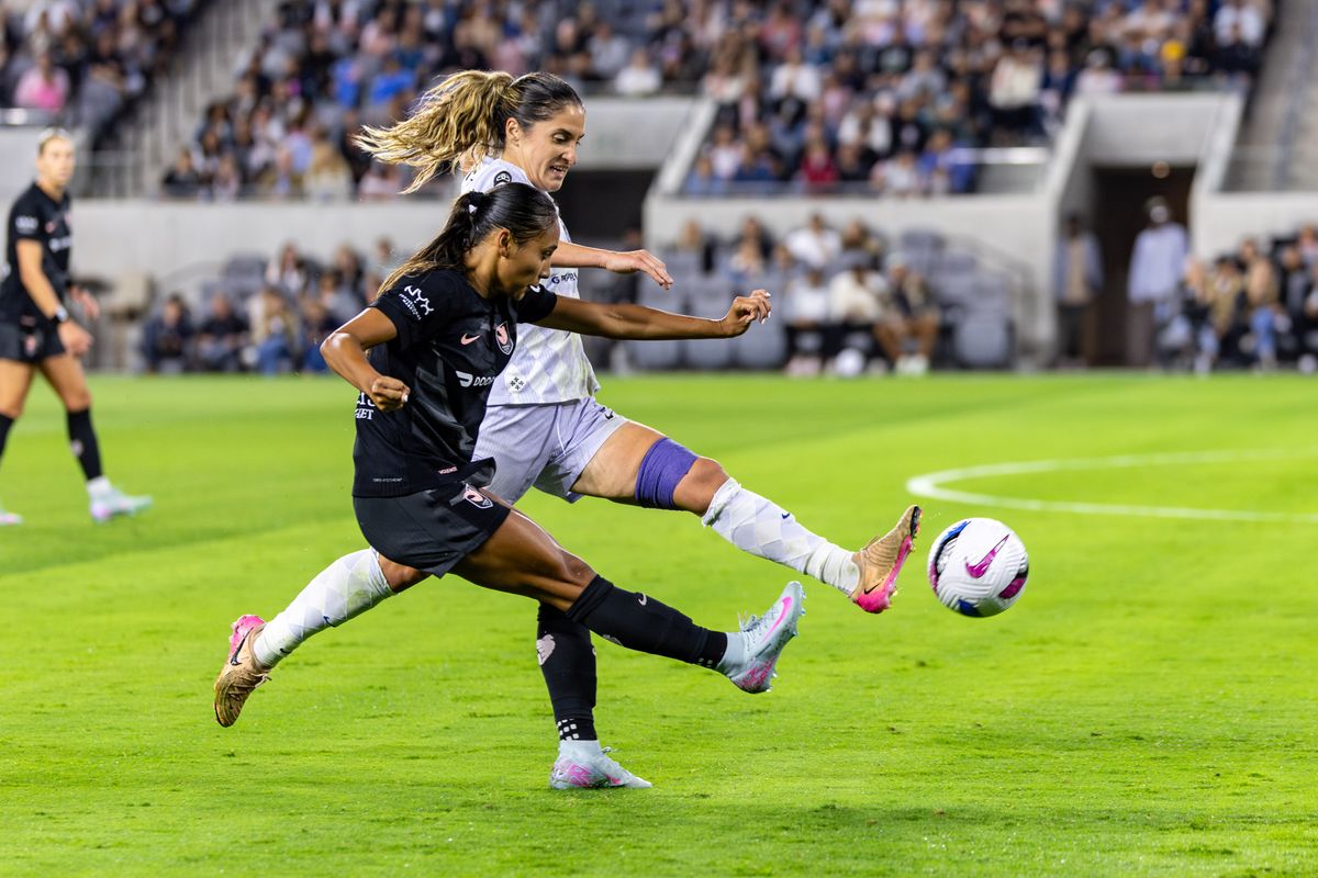 Angel City FC attacker Alyssa Thompson (21) passes the ball upfield during an NWSL match against Racing Louisville FC, Saturday May 24, 2025 in Los Angeles, Calif.