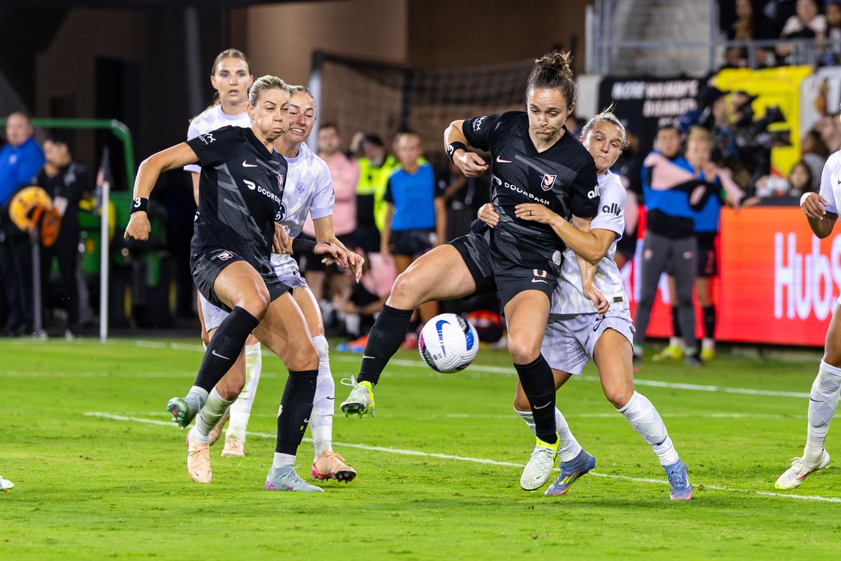 Angel City FC defender Megan Reid (6) makes a play on the ball during an NWSL match against Racing Louisville FC, Saturday May 24, 2025 in Los Angeles, Calif.