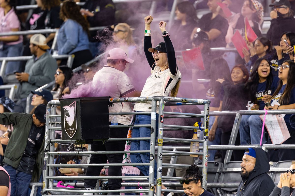 Angel City FC supporter celebrates the 100th regular season goal in Angel City FC franchise history during an NWSL match against Racing Louisville FC, Saturday May 24, 2025 in Los Angeles, Calif.